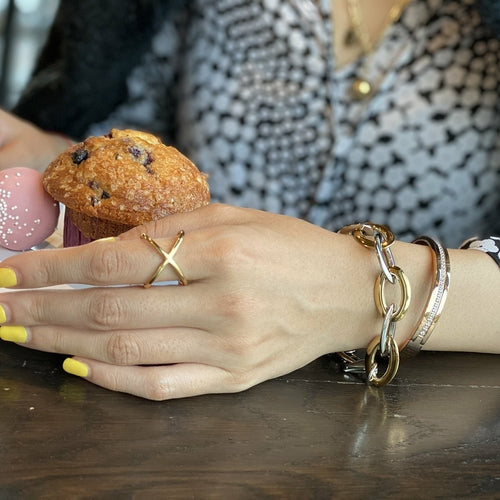 Gold Skinny Crisscross Band Ring in polished gold-tone metal with a slim, intersecting design for elegant everyday wear.