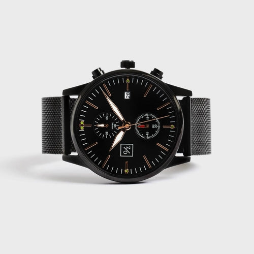 Men's Steel Mesh-Belt Watch with a silver stainless steel band and round black minimalist dial.