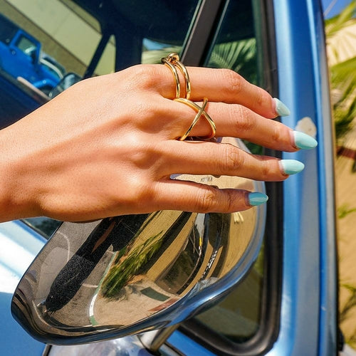 Gold Skinny Crisscross Band Ring in polished gold-tone metal with a minimalist design, perfect for everyday wear.