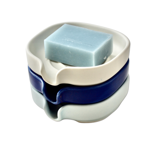 Self-Draining Porcelain Soap Dish in white with drainage holes for soap longevity and easy drying