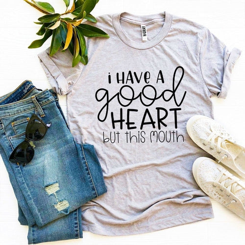 I Have a Good Heart But This Mouth T-shirt in black cotton with bold white text, casual unisex wear.