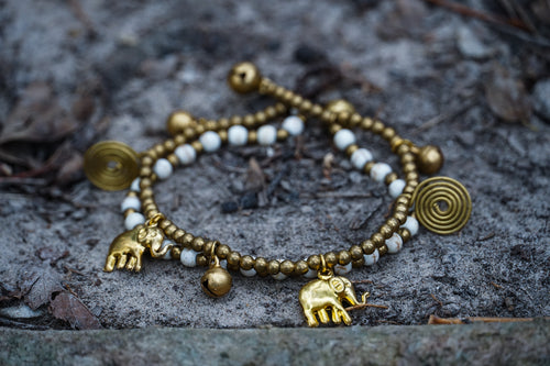 Boho Elephant Bracelets in brass with white accents, stylish accessories for casual or bohemian outfits.