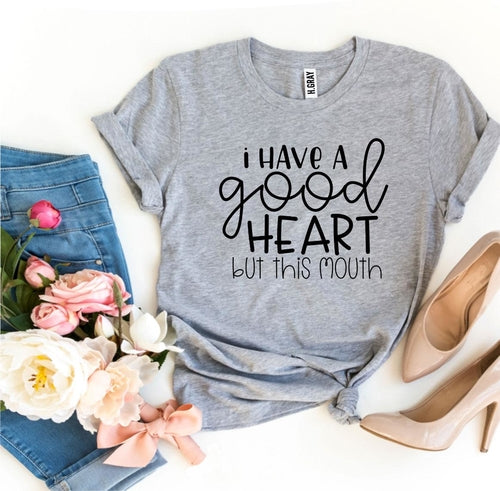 I Have a Good Heart But This Mouth T-shirt in black cotton with bold white text, casual wear for expressive personalities.