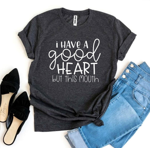 I Have a Good Heart But This Mouth T-shirt in black with white text, made of soft cotton for casual wear.