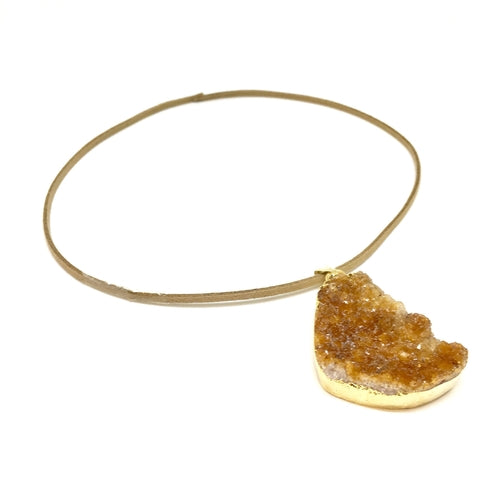 Orange Citrine Cluster Pendant with vibrant orange citrine stones in a clustered design on a silver chain.