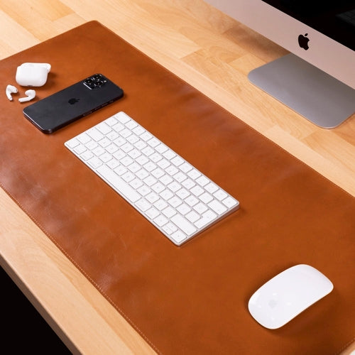 Rawlins Leather Desk Pads in black and brown, available in 36x19 and 14.6x31.5 inches, made of premium genuine leather for office protection