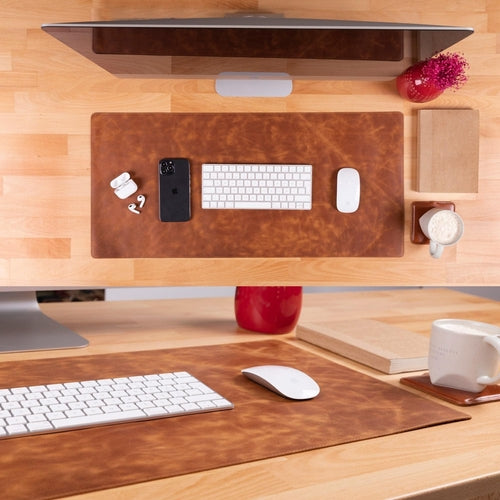 Rawlins Leather Desk Pads in brown, available in 36x19 and 14.6x31.5 inches, made of premium leather for stylish workspace protection.