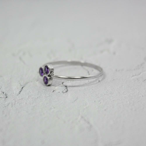 Amethyst Cluster Sterling Silver Ring with a vibrant purple gemstone set in a polished silver band for elegant wear