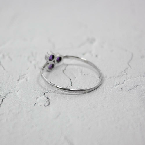 Amethyst Cluster Sterling Silver Ring featuring a vibrant purple amethyst cluster set in a polished sterling silver band.